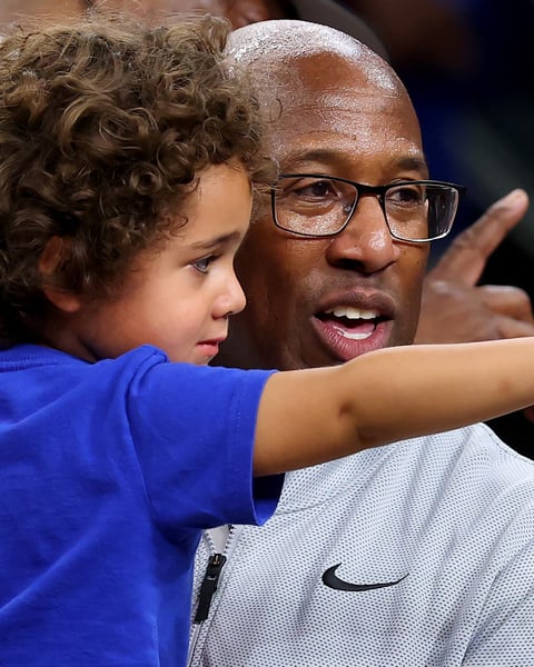 Mike Brown laughs and celebrates on the court after the New York Knicks win the 2026 NBA Championship at Frost Bank Center