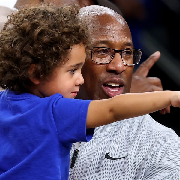 Mike Brown laughs and celebrates on the court after the New York Knicks win the 2026 NBA Championship at Frost Bank Center