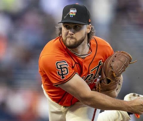 San Francisco Giants players wear Pride Night caps during MLB controversy over handwritten Bible verses