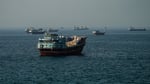 Cargo ships pass through the Strait of Hormuz as Iran-US tensions reshape Gulf shipping routes