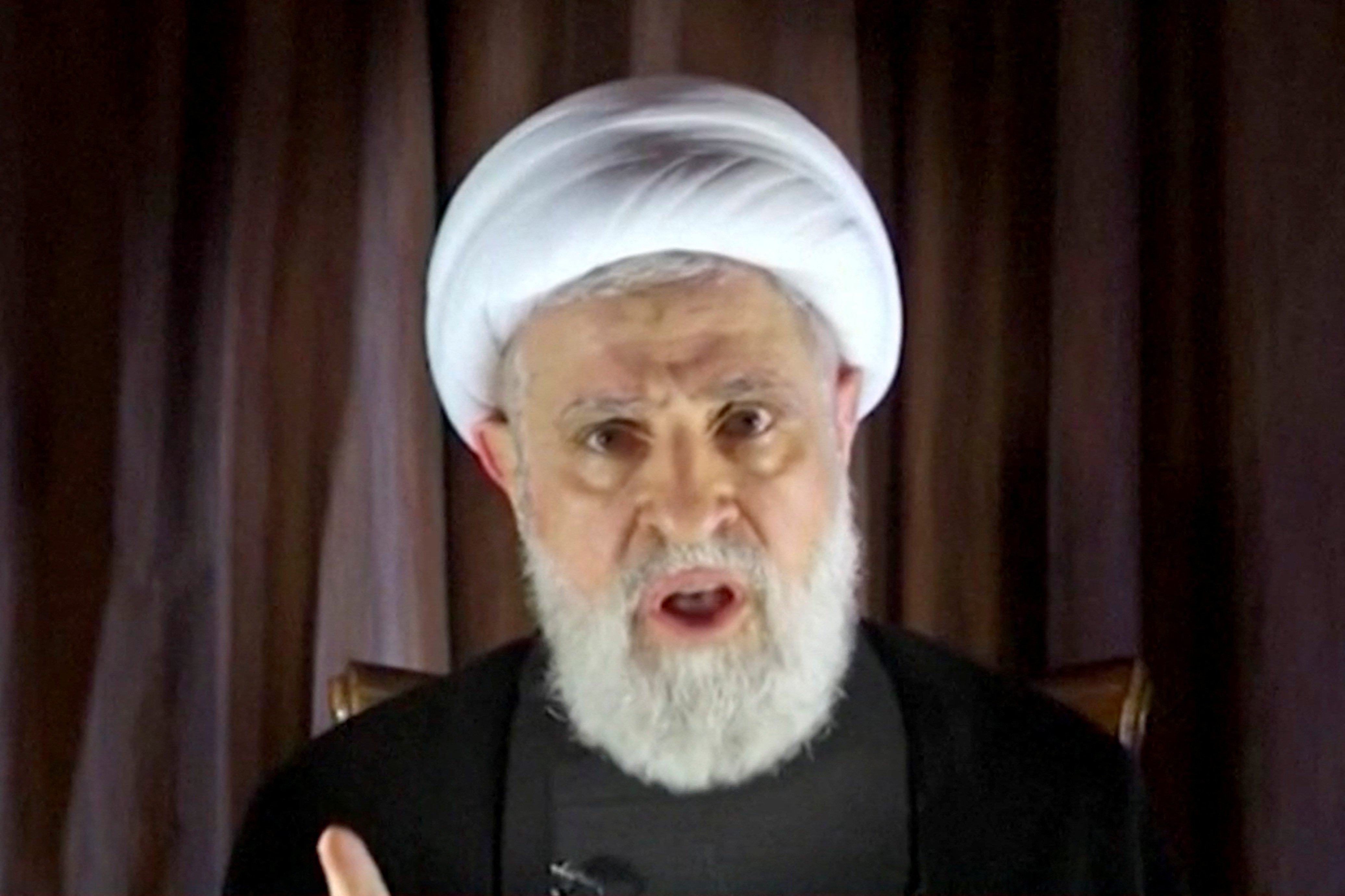 Hezbollah Secretary-General Naim Qassem delivering televised speech rejecting Washington ceasefire deal, June 2026