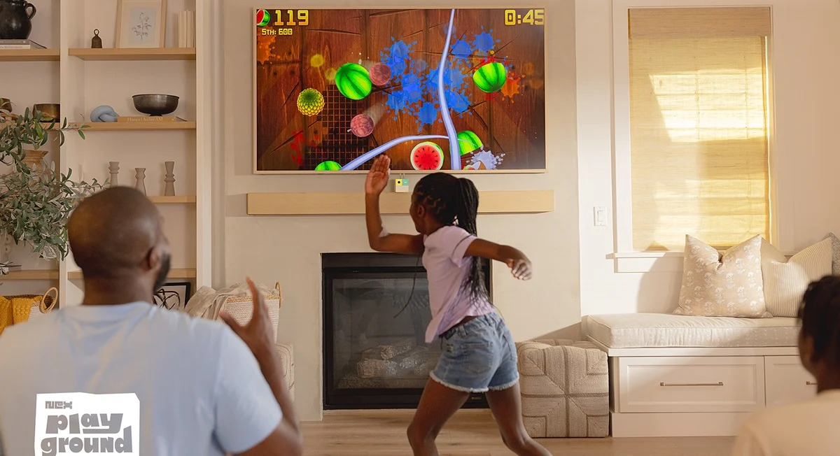 Active Family Gaming With Nex Playground Family using Nex Playground to play motion-controlled games in a living room