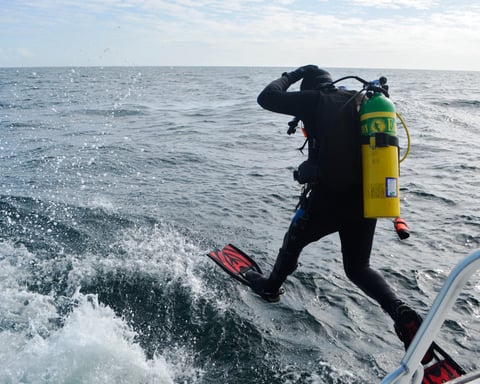 A NOAA scientific monitoring buoy being deployed at sea, the kind of ocean observing instrument the US is now removing