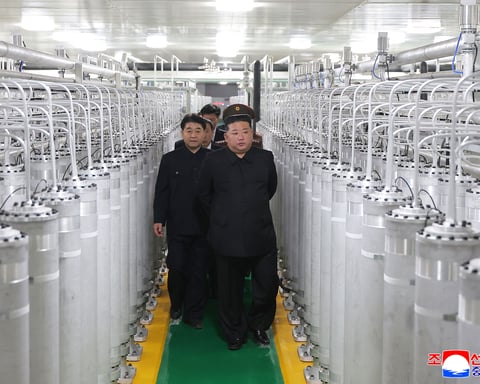 North Korean leader Kim Jong Un inspects a newly inaugurated nuclear materials factory