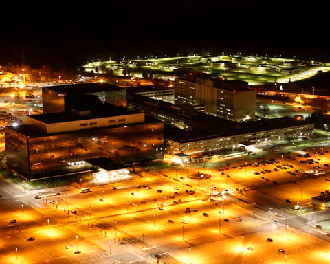 Aerial view of NSA headquarters at Fort Meade, whose Section 702 collection continues despite the statute's lapse