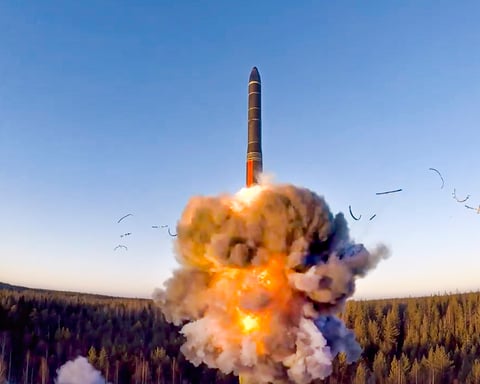 A ballistic missile lifts off during a test launch as global nuclear weapons spending hits a record high