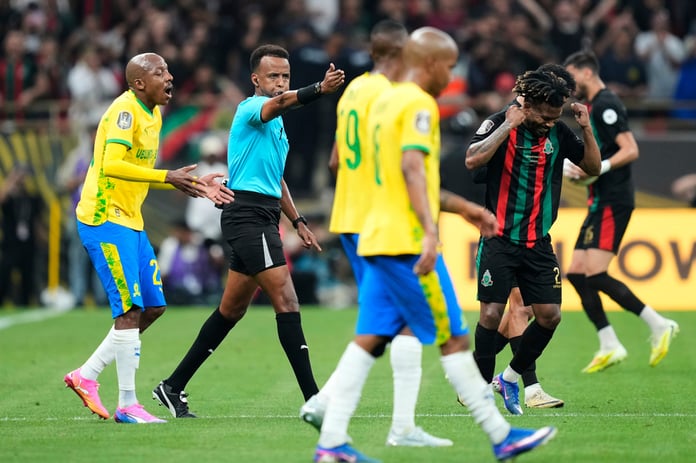 Somali referee Omar Artan signals a penalty during the CAF Champions League final in Rabat Morocco