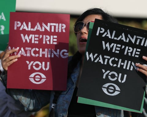 Protesters demonstrate against the surveillance firm Palantir outside its US headquarters