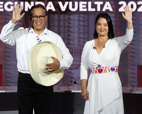 Keiko Fujimori and Roberto Sanchez wave at televised debate ahead of Peru presidential runoff June 2026
