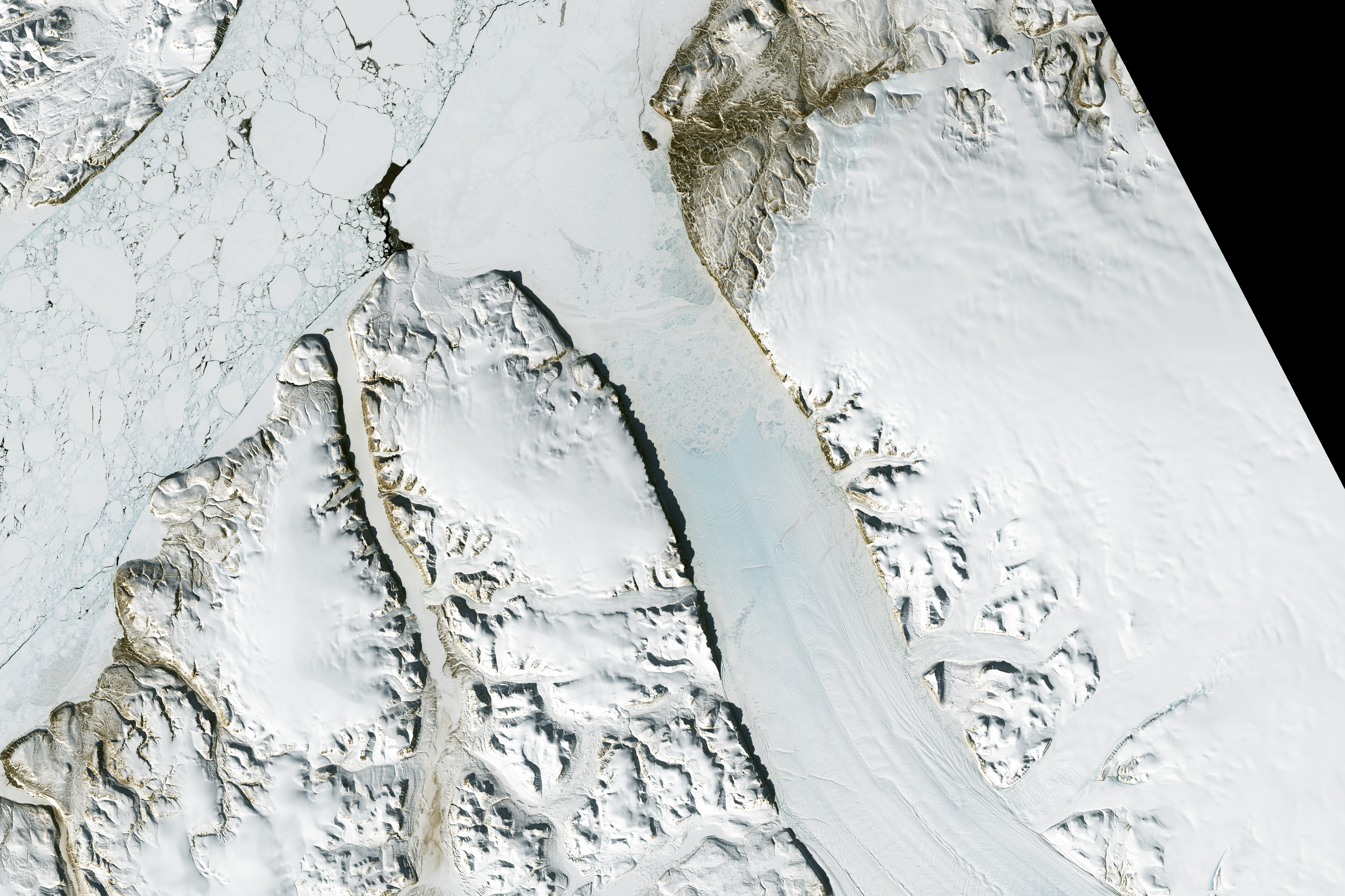 NASA Landsat 8 satellite image of Petermann Glacier in northwestern Greenland showing rift patterns in the floating ice tongue