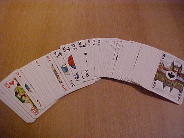 Playing cards representing the element of chance at the center of the Whatnot gambling lawsuit, which alleges randomized card breaks constitute an illegal lottery under California law