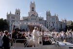 Pope Leo XIV waves from the popemobile at Plaza de Cibeles, Madrid, for Corpus Christi Mass June 2026