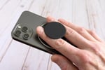 PopSockets Low-Pro Grip attached to an iPhone showcasing its ultra-thin MagSafe-compatible design