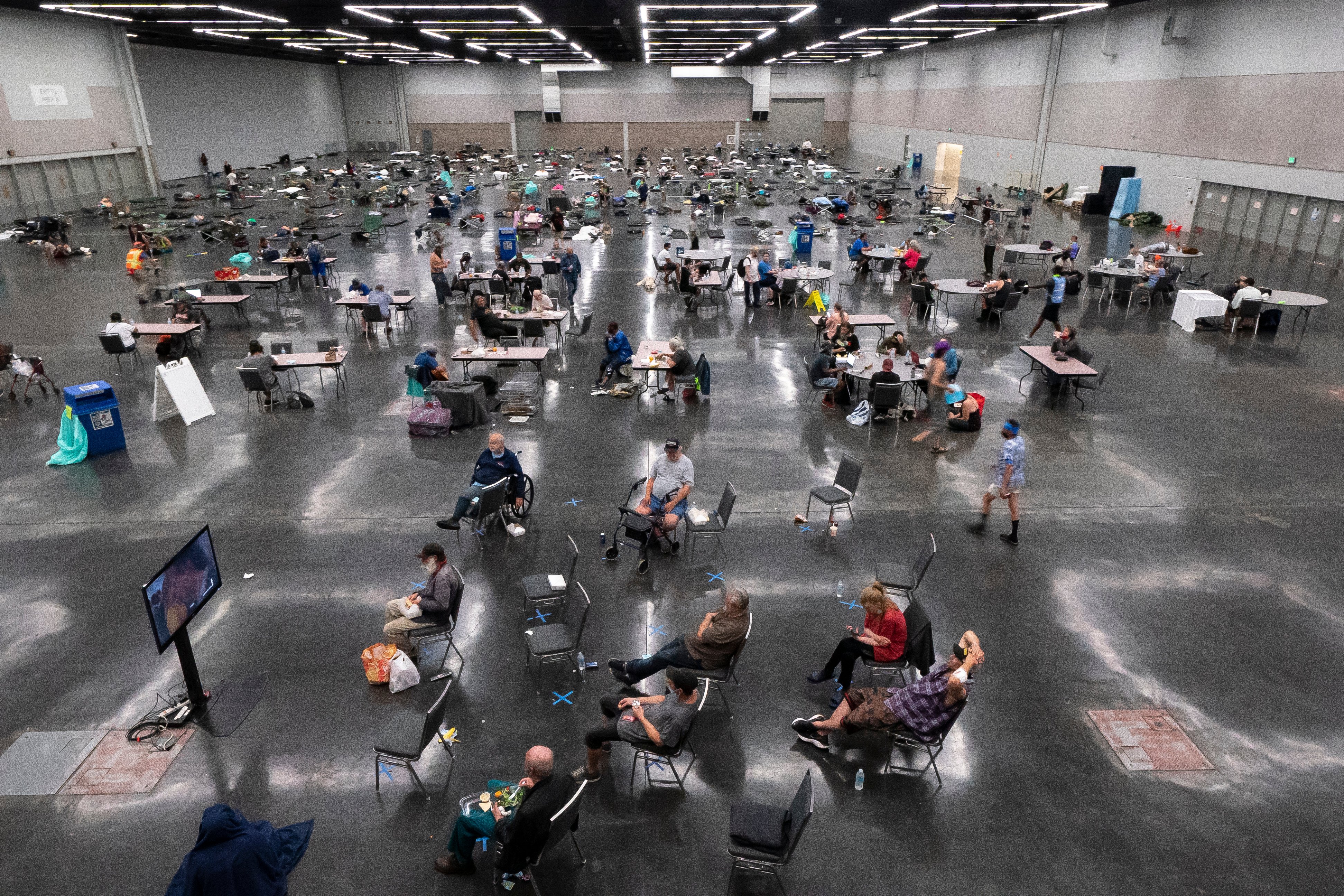 Portland residents shelter from the deadly 2021 heat wave at the Oregon Convention Center, the disaster at the center of Multnomah County's climate lawsuit