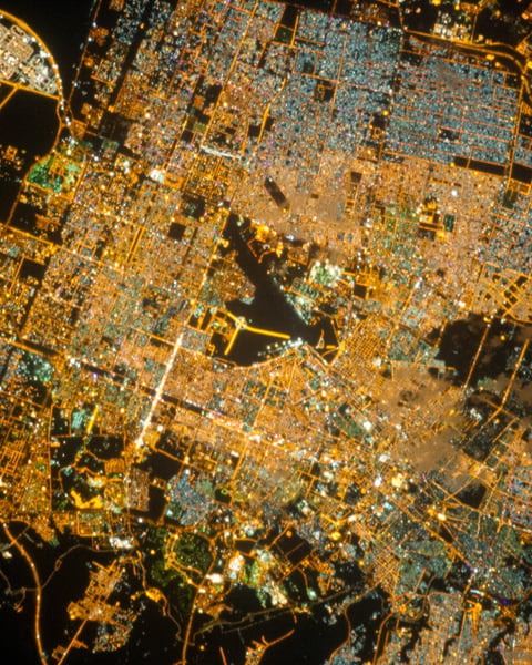 NASA astronaut photograph of Riyadh Saudi Arabia at night from the International Space Station showing the brightly illuminated capital radiating along ring roads from a glowing central business district