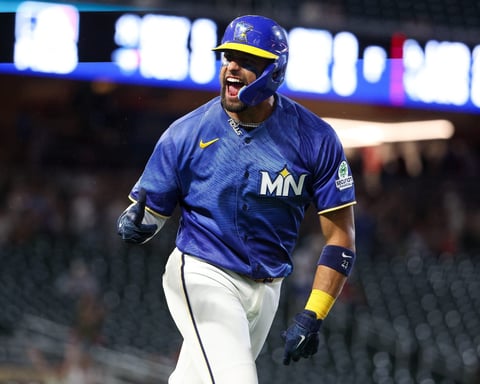 Royce Lewis of the Minnesota Twins celebrates his solo home run off Cardinals reliever Ryne Stanek in the eighth inning at Target Field, June 12 2026