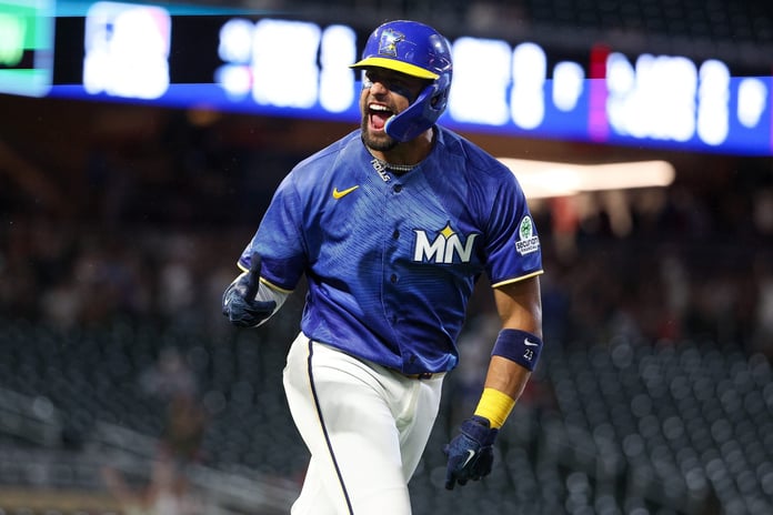 Royce Lewis of the Minnesota Twins celebrates his solo home run off Cardinals reliever Ryne Stanek in the eighth inning at Target Field, June 12 2026
