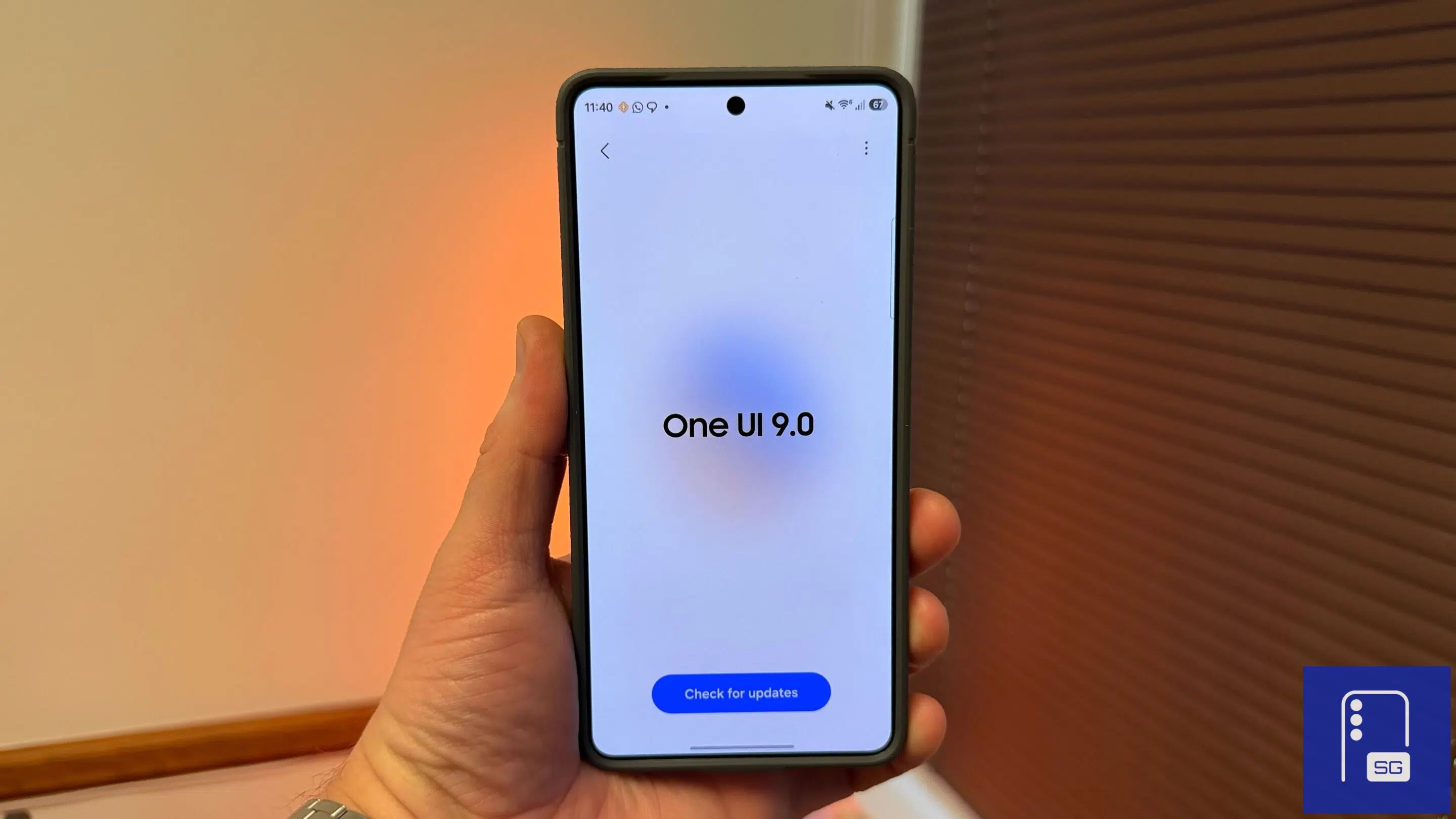 Samsung Galaxy S26 Ultra with One UI 9 logo representing the new status bar network speed meter feature