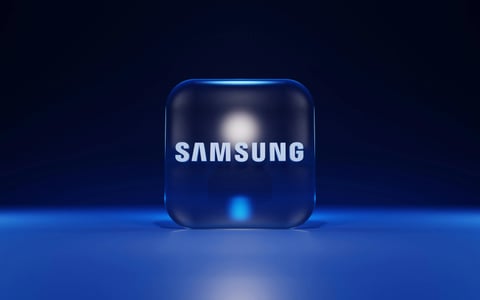Samsung SmartThings hub and app displayed on a smartphone showing smart home device controls