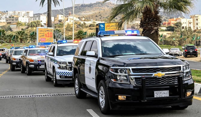 Saudi Arabia immigration enforcement officers detaining illegal residents during a nationwide crackdown