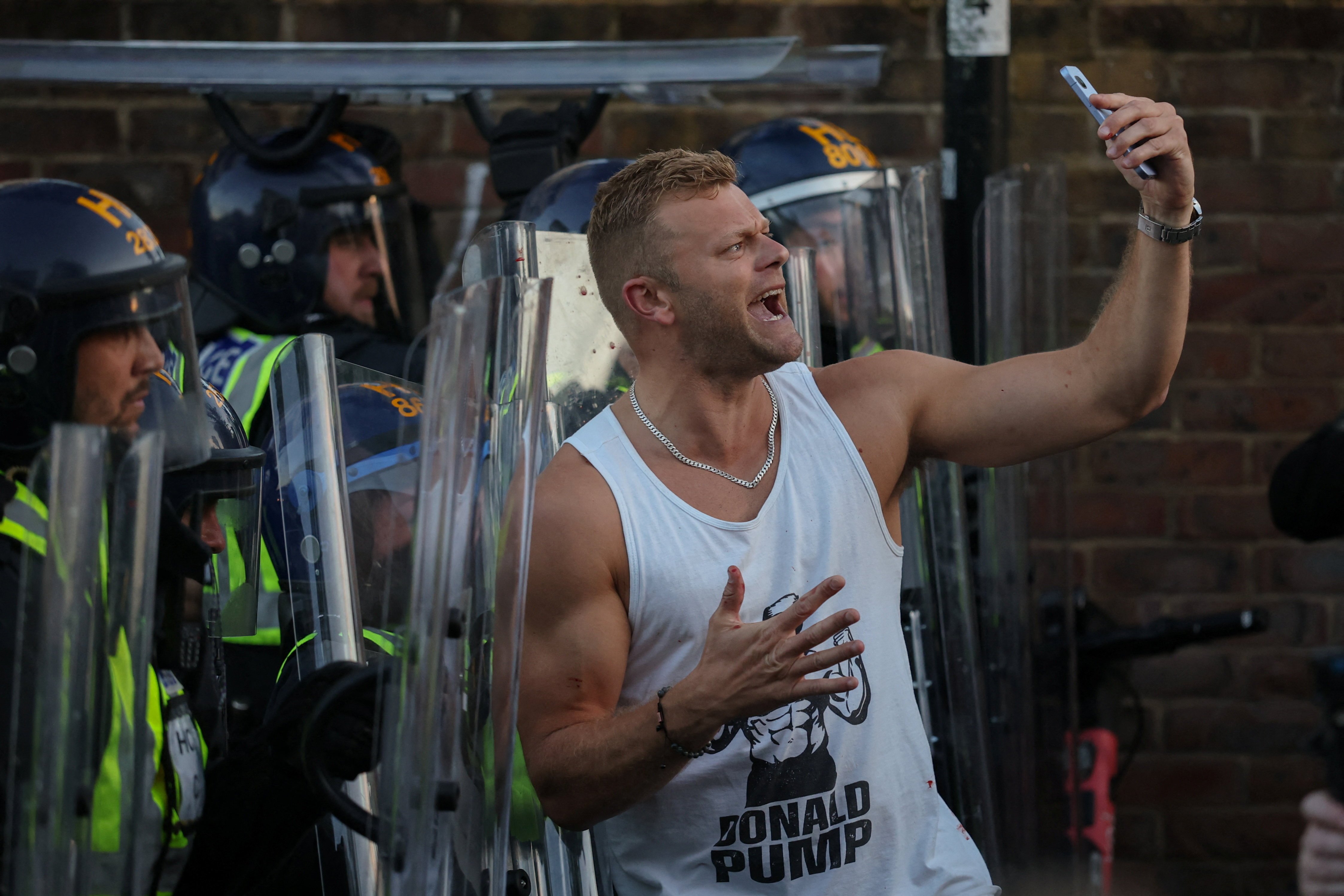 Protesters clash with police officers in Southampton during demonstrations following the conviction of Vickrum Digwa for the murder of student Henry Nowak