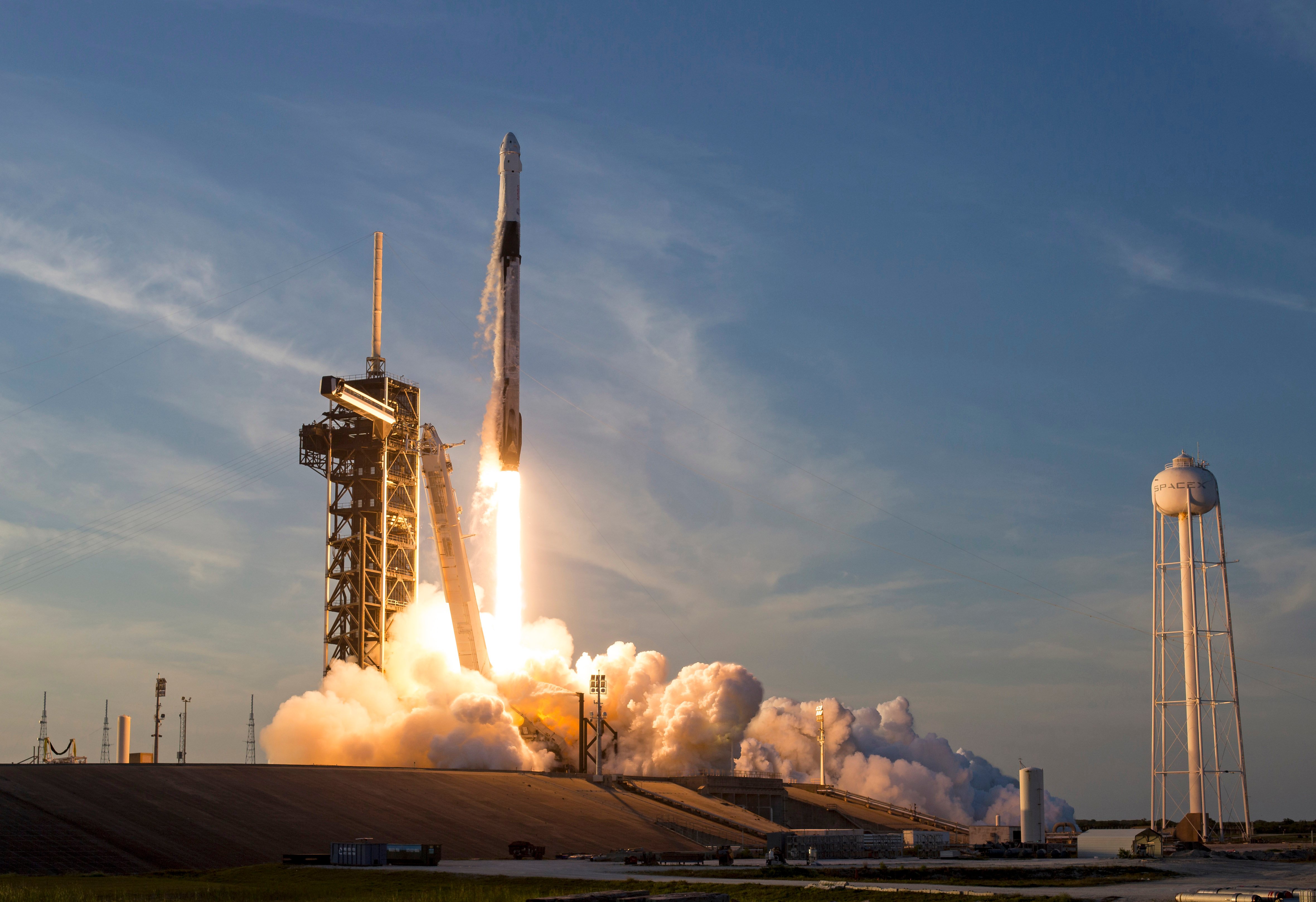 SpaceX Falcon 9 rocket lifting off from Kennedy Space Center ahead of the company's record Nasdaq IPO