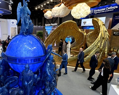 Participants tour the exhibition at the St. Petersburg International Economic Forum SPIEF 2026 Russia