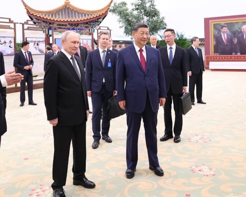 Russian President Vladimir Putin and Chinese Vice President Han Zheng at a joint event ahead of SPIEF 2026
