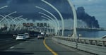 Black smoke rises over the port of St. Petersburg as the SPIEF 2026 economic forum opens