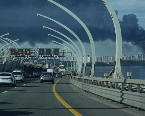 Black smoke rises over the port of St. Petersburg as the SPIEF 2026 economic forum opens