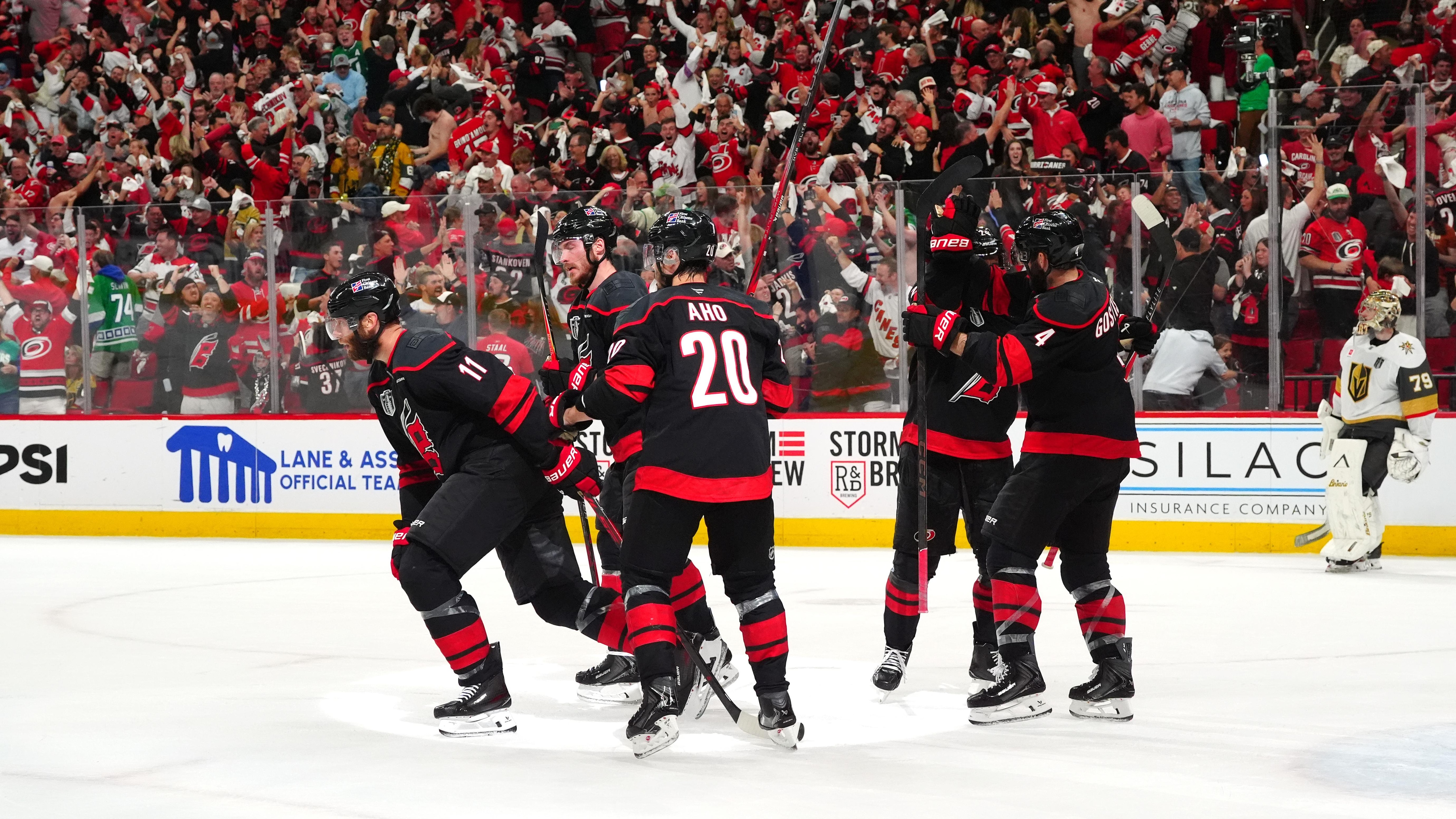 Logan Stankoven and Andrei Svechnikov celebrate after the Carolina Hurricanes comeback in Game 2 of the 2026 Stanley Cup Final against the Vegas Golden Knights