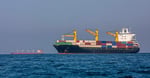 A vessel anchored in the Strait of Hormuz on May 16 2026 as EU applies freedom of navigation sanctions on Iran