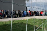 A line of Syrian refugees crossing a European border, the kind of asylum seekers the new EU pact governs