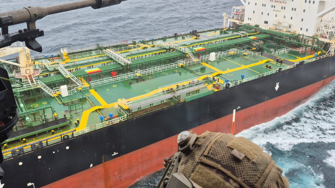 French Navy personnel approach the sanctioned oil tanker Tagor in the Atlantic Ocean