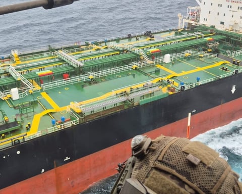 French Navy personnel approach the sanctioned oil tanker Tagor in the Atlantic Ocean