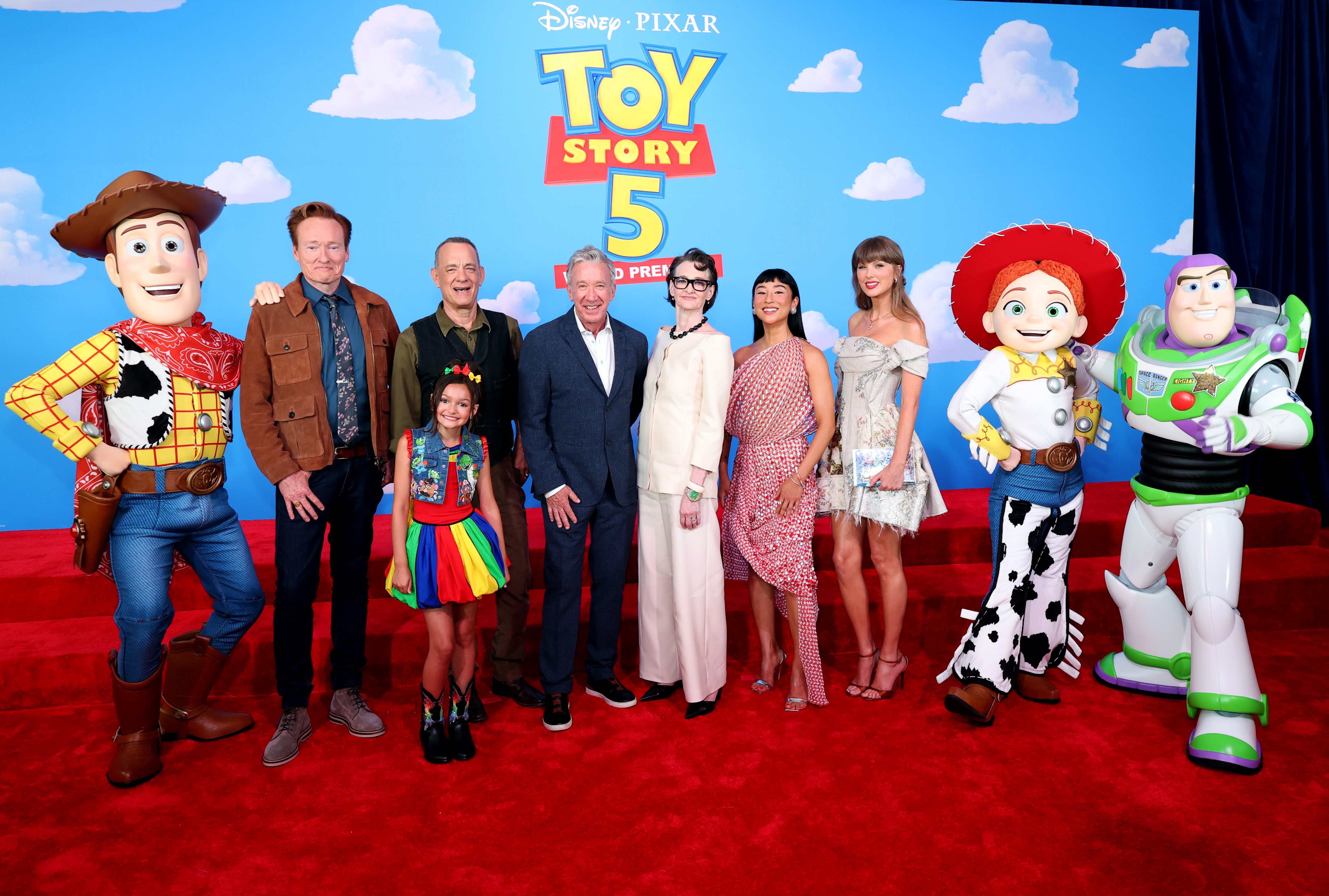 Joan Cusack with Tom Hanks, Tim Allen, Greta Lee, Taylor Swift, Conan O'Brien and Scarlett Spears at the Toy Story 5 world premiere at Dolby Theatre on June 9, 2026, her first red-carpet appearance in 11 years