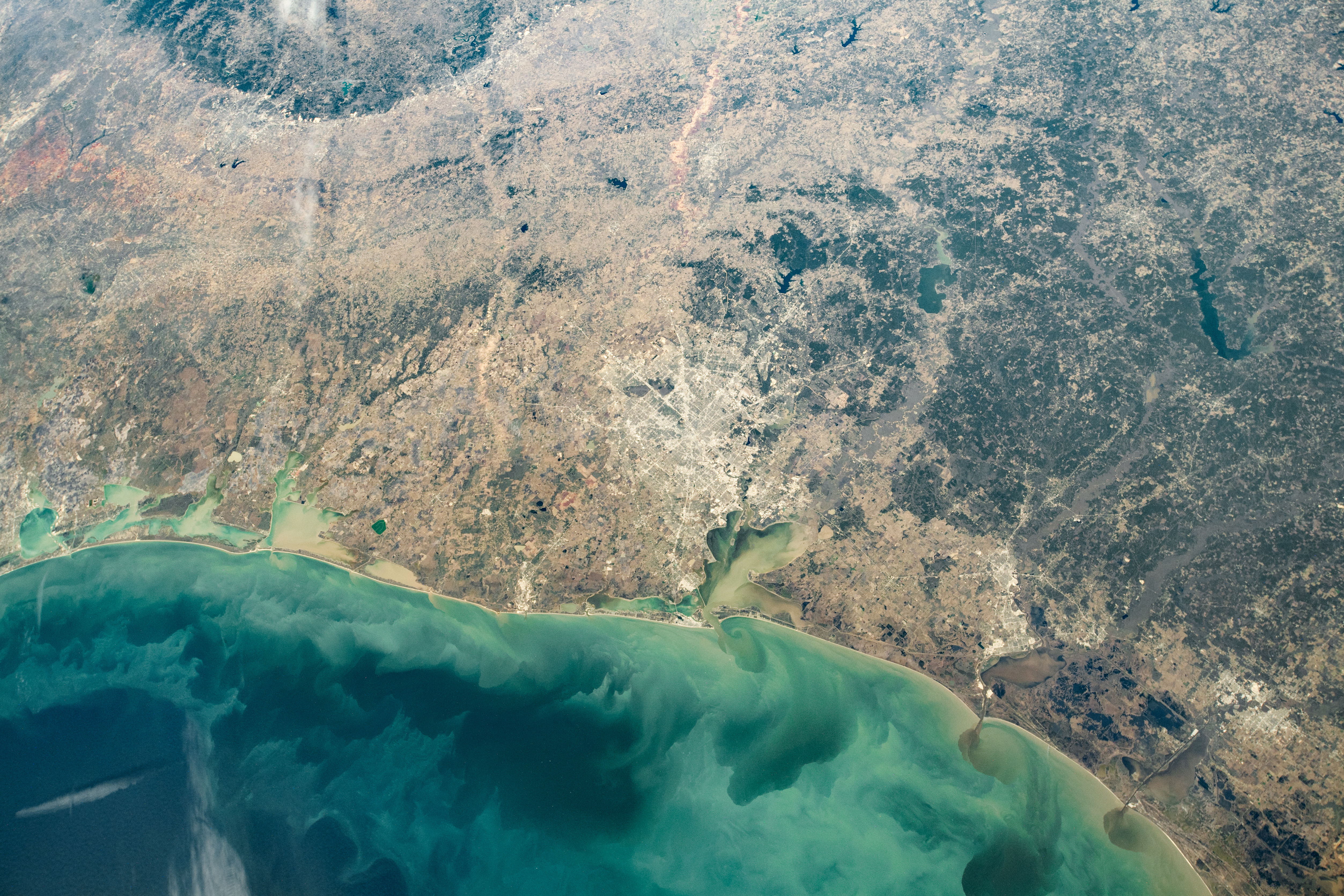 NASA astronaut photograph from ISS of Texas Gulf Coast centered on Houston showing barrier islands and Lavaca Bay December 2020