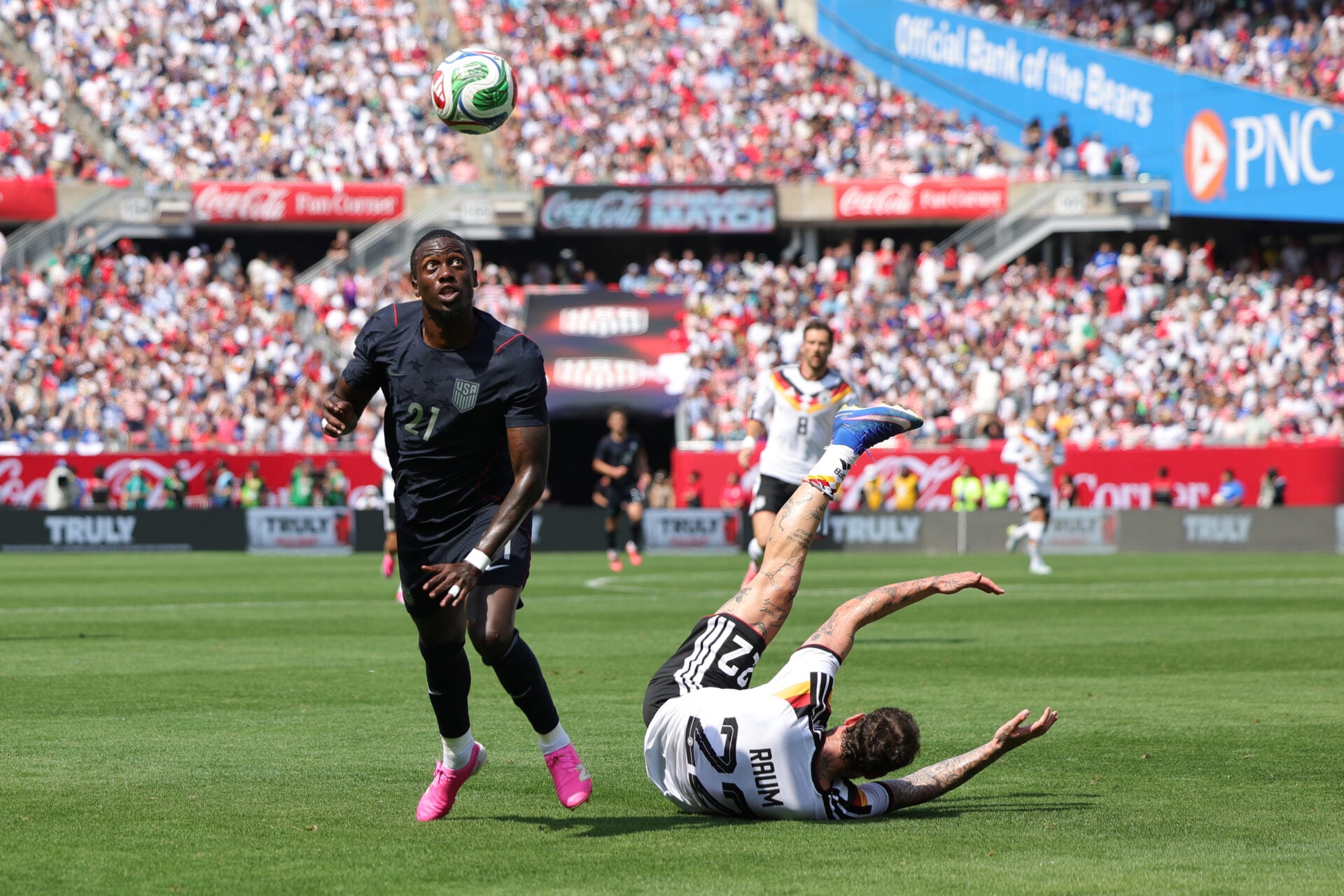 Timothy Weah of the United States controls the ball against David Raum of Germany during the international friendly at Soldier Field June 2026