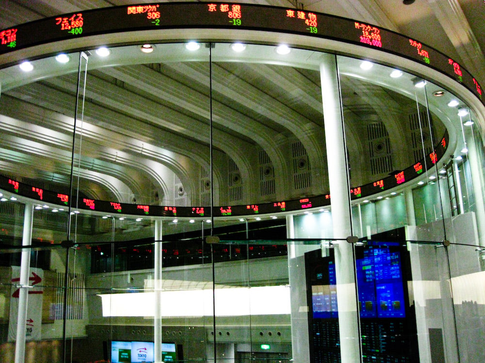 The market center at the Tokyo Stock Exchange, where Japanese chip-equipment stocks led Monday's tech rally