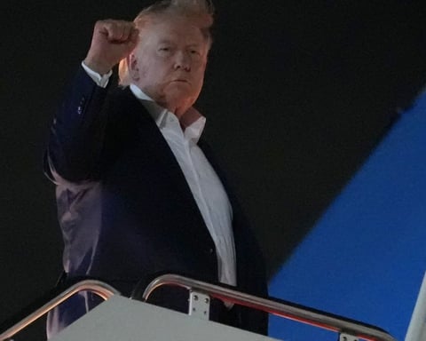 President Donald Trump gestures as he boards Air Force One at Joint Base Andrews for the G7 summit in France June 15 2026