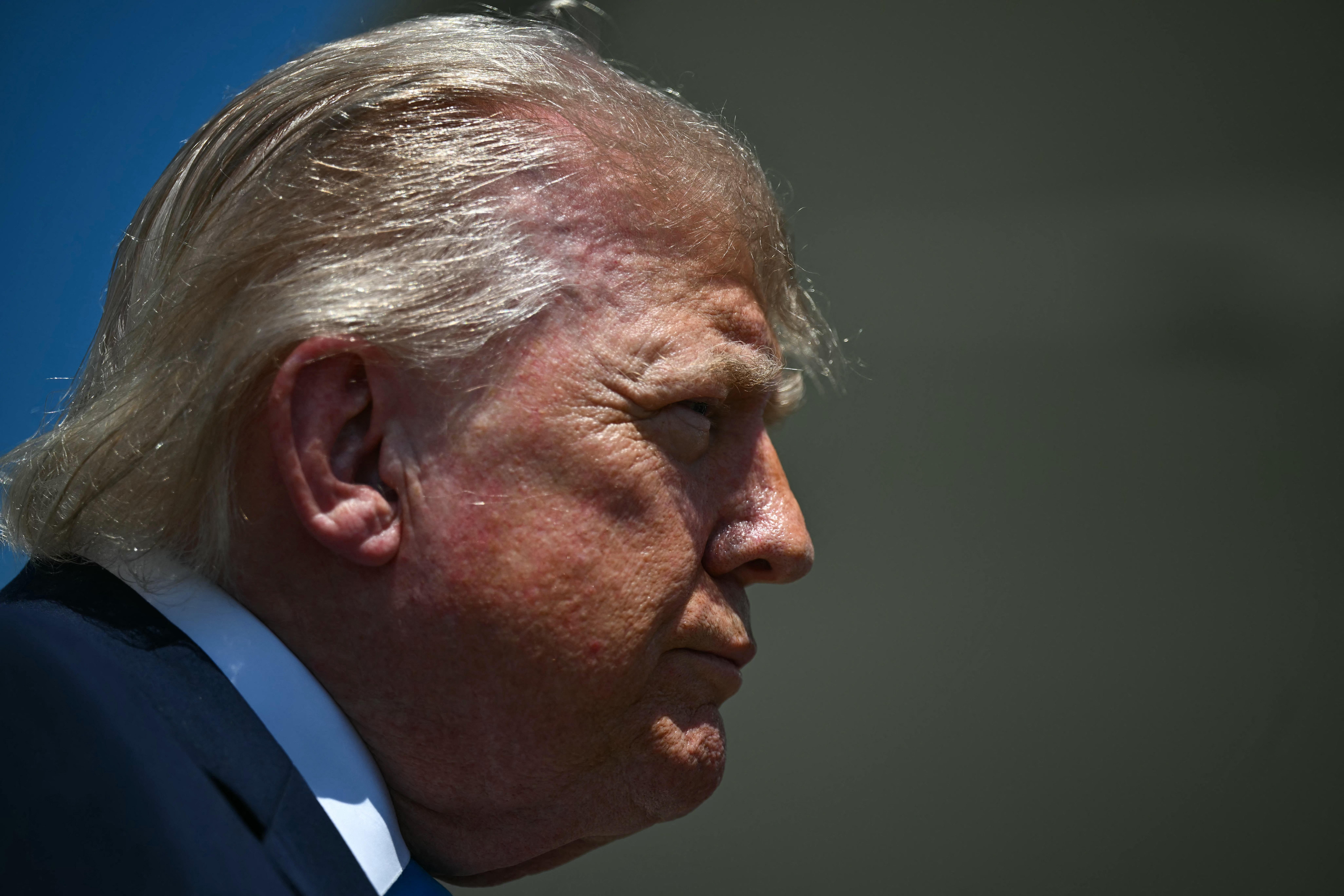 US President Donald Trump speaks to reporters