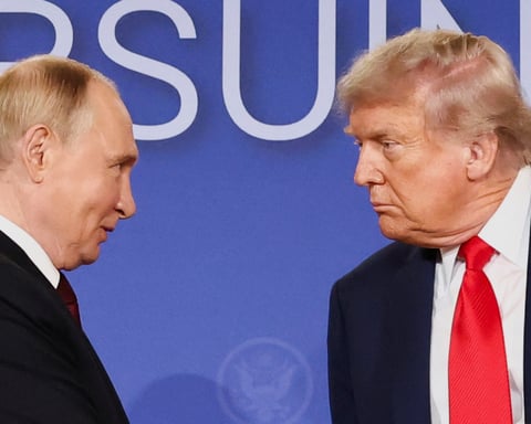 US President Donald Trump and Russian President Vladimir Putin look at each other during a press conference following their meeting in Anchorage, Alaska, August 15, 2025