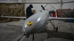 A Ukrainian serviceman prepares a long-range drone for deployment against Russian naval targets, June 2026