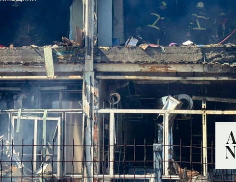 Ukrainian emergency personnel at a site damaged by Russian drone strike in Ukraine June 7 2026