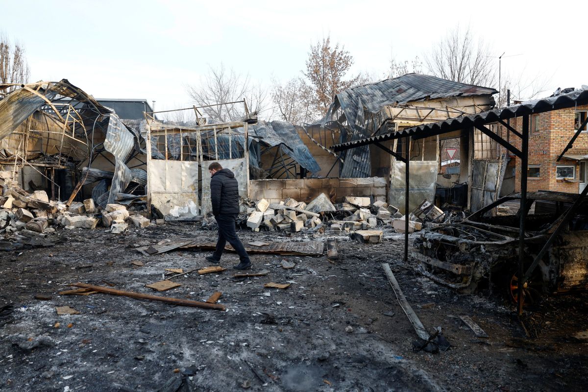 Emergency workers at the site of a strike in Kyiv, Ukraine