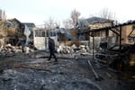 Emergency workers at the site of a strike in Kyiv, Ukraine