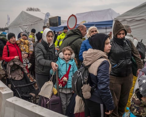 Ukrainian refugees crossing into EU territory after fleeing the Russian operation in Ukraine