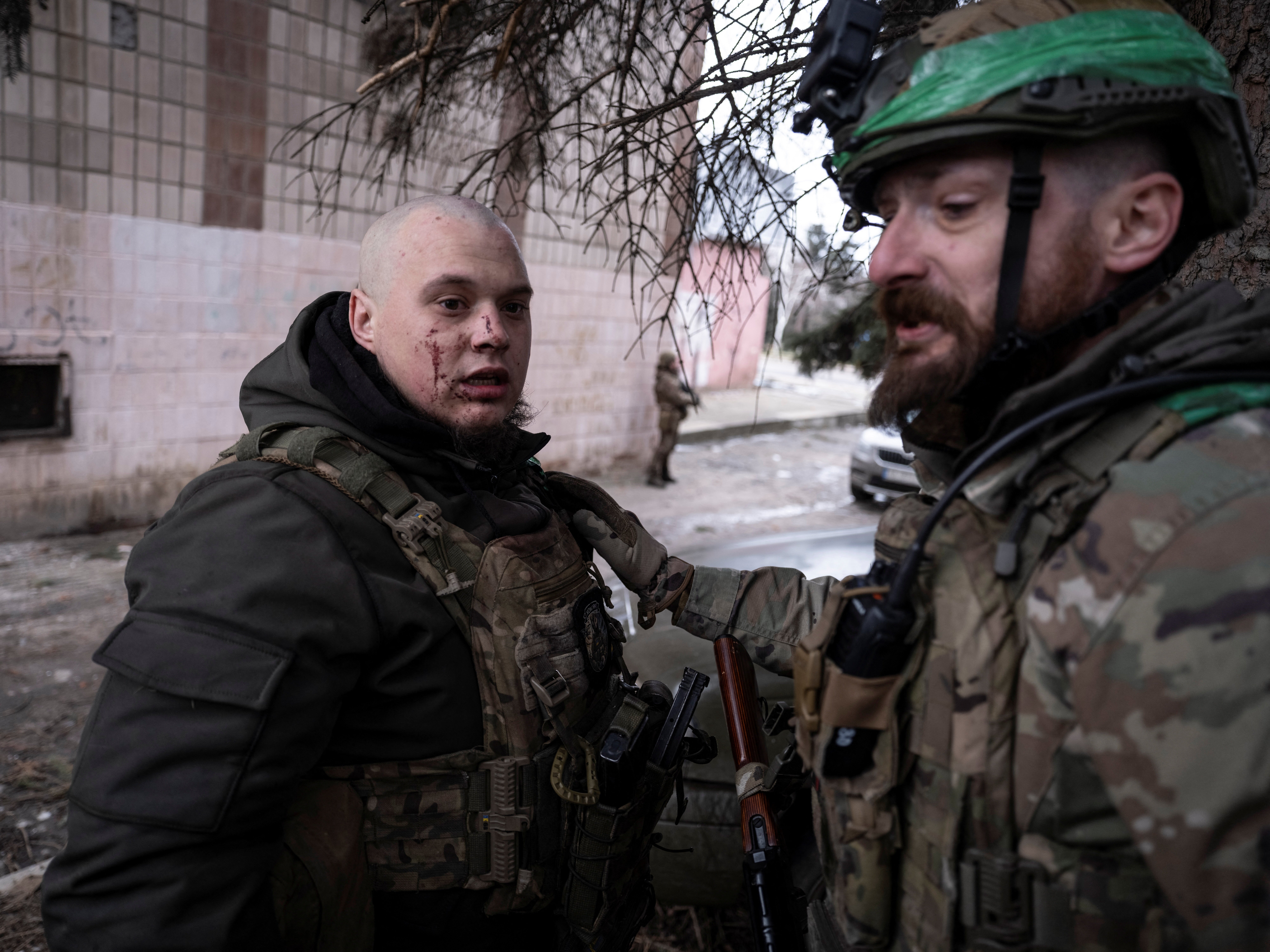 Ukrainian soldier assists injured comrade during medical evacuation from frontline town of Druzhkivka, Donetsk region, amid Russia-Ukraine war
