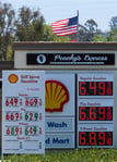 A gas station displays fuel prices