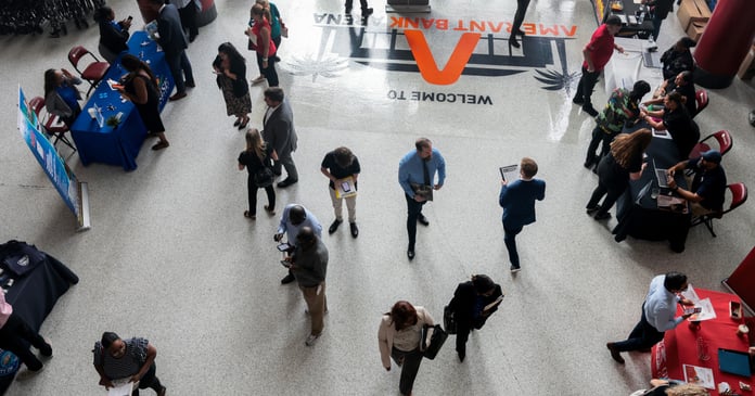 Job seekers at an employment fair in the United States ahead of the May 2026 jobs report